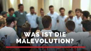 Gruppe junger Männer bei einem Workshop zur Männlichkeitsentwicklung.